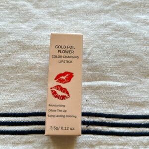 NWT Gold foil flower color changing lipstick 0.12 0Z.